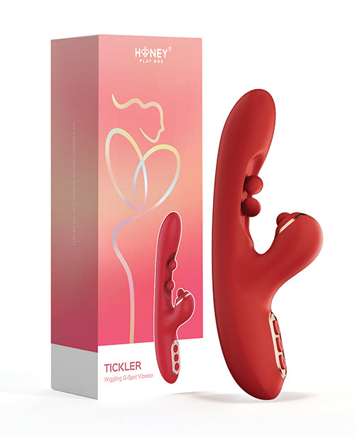 Close-up of red Tickler's silicone texture, showcasing the twin ball design on the curved shaft.