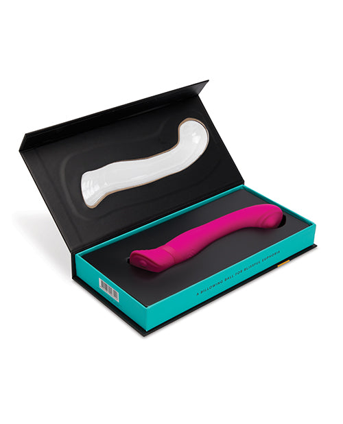 Hand holding a waterproof G-spot vibrator, perfect for bath or shower use.